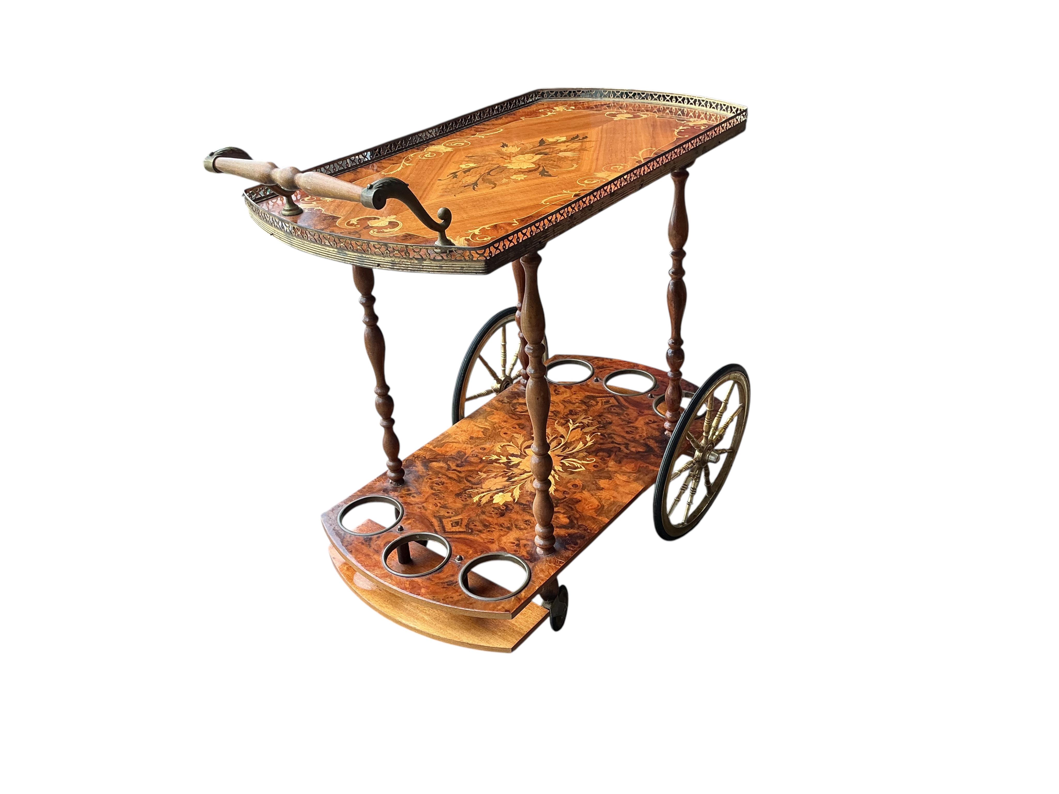 An Italian marquetry inlaid walnut two tier drinks trolley, width 79cm, depth 40cm, height 79cm